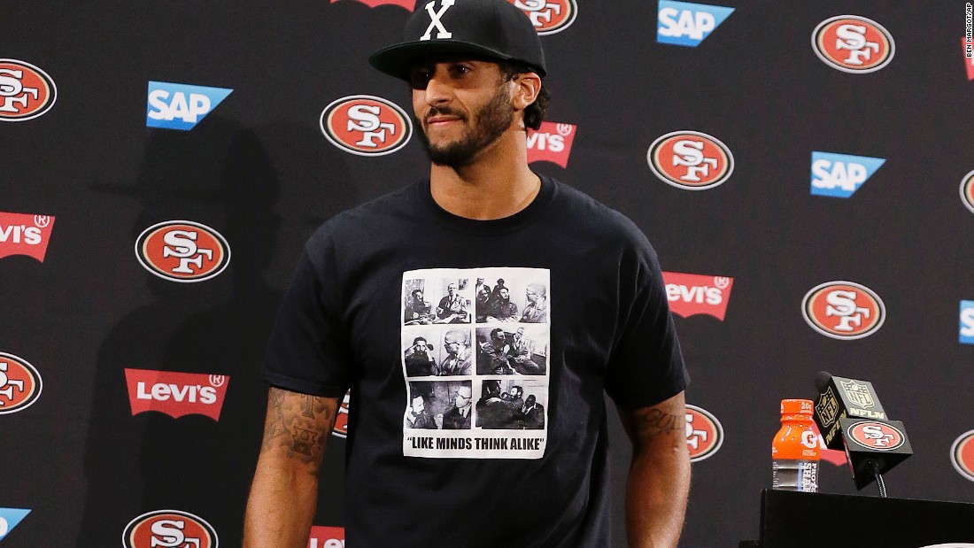 Colin Kaepernick still is at the center of controversy for wearing this T-shirt back in August. (Image via CNN)
