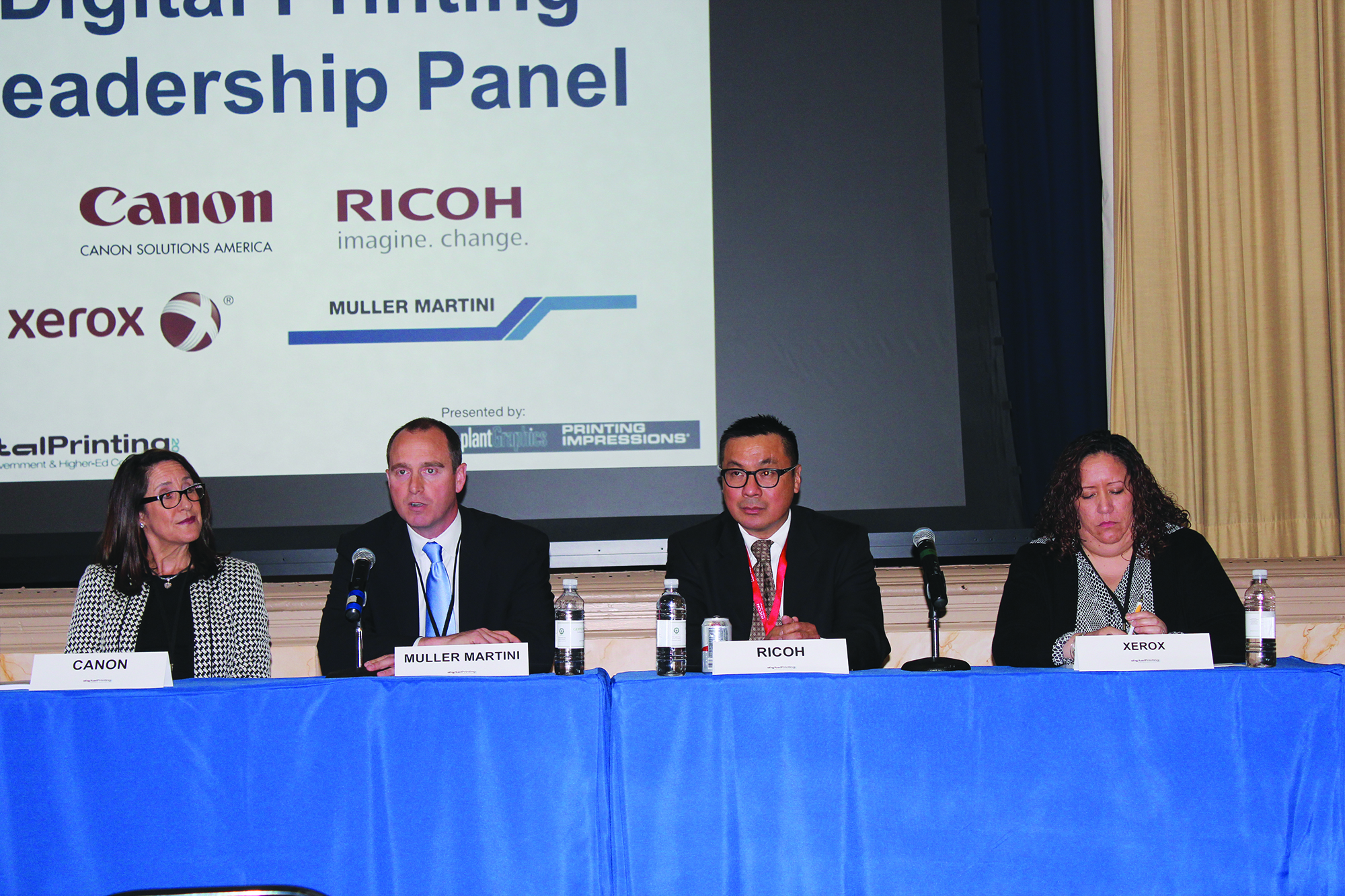The Digital Printing Leadership Panel gave the top conference sponsors  a chance to explain how their solutions can help in-plants succeed.  From the left: Sheri Jammallo (Canon Solutions America); Mike Wing (Muller Martini); Ed Wong (Ricoh USA); and Lucy Perez (Xerox). 