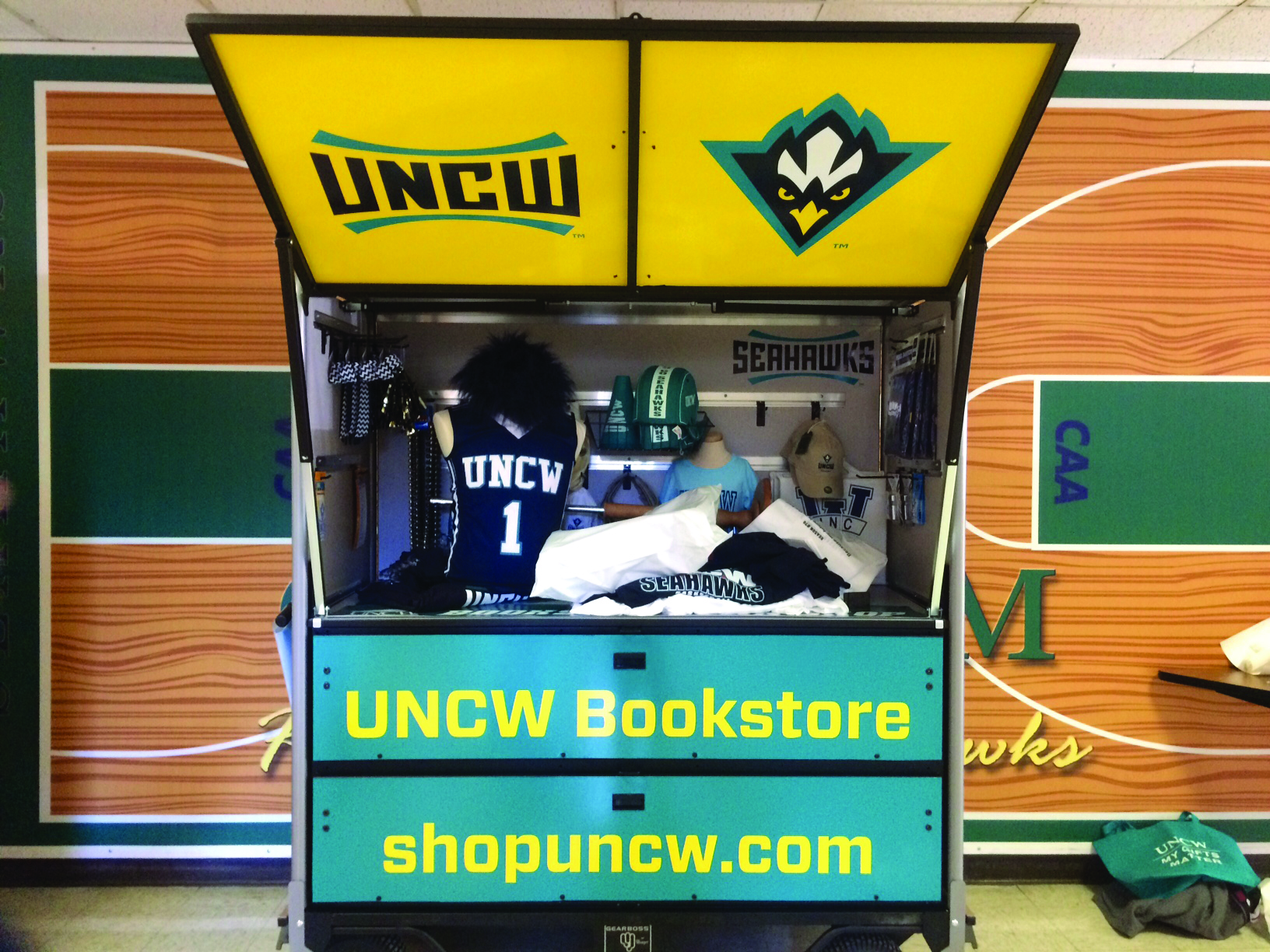 Printing Services used vinyl to spruce up this kiosk, which the athletics department uses to sell its merchandise.