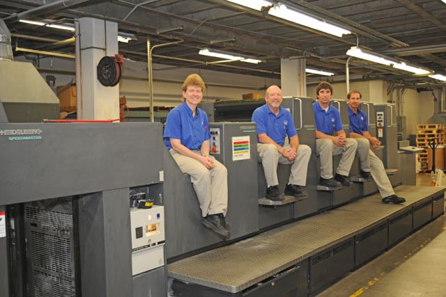The in-plant’s offset presses allow it to handle longer run jobs, such as Western & Southern’s annual report. Taking a break on the shop’s Heidelberg Speedmaster 74 are (from left) Michele Schiery, Gary Forge, Brent Corbin and Rick Elsaesser.