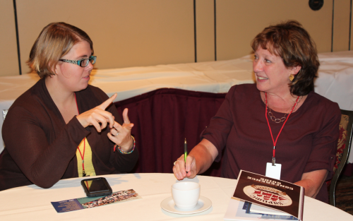 Sarah Gregory, of Eastern Kentucky University, talks with Jo Ann Fincken, of Northern Kentucky University.